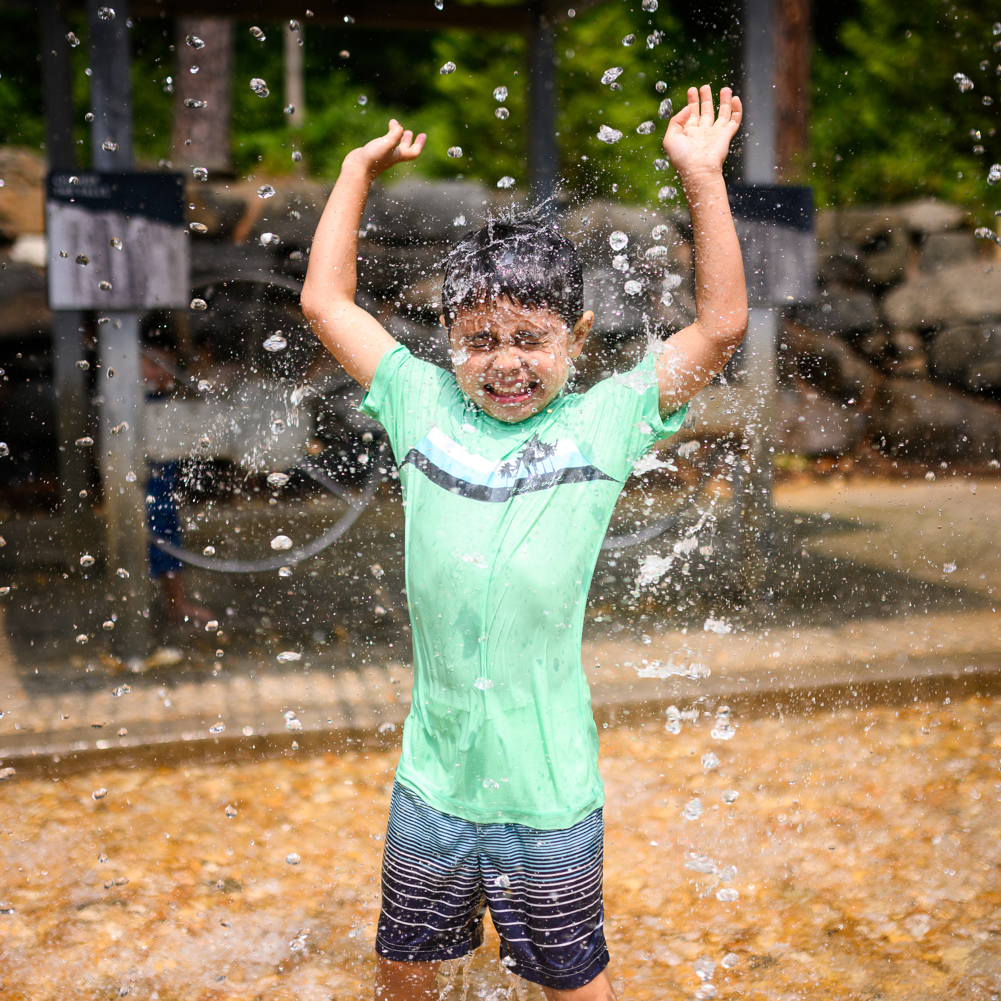 Child being splashed by water